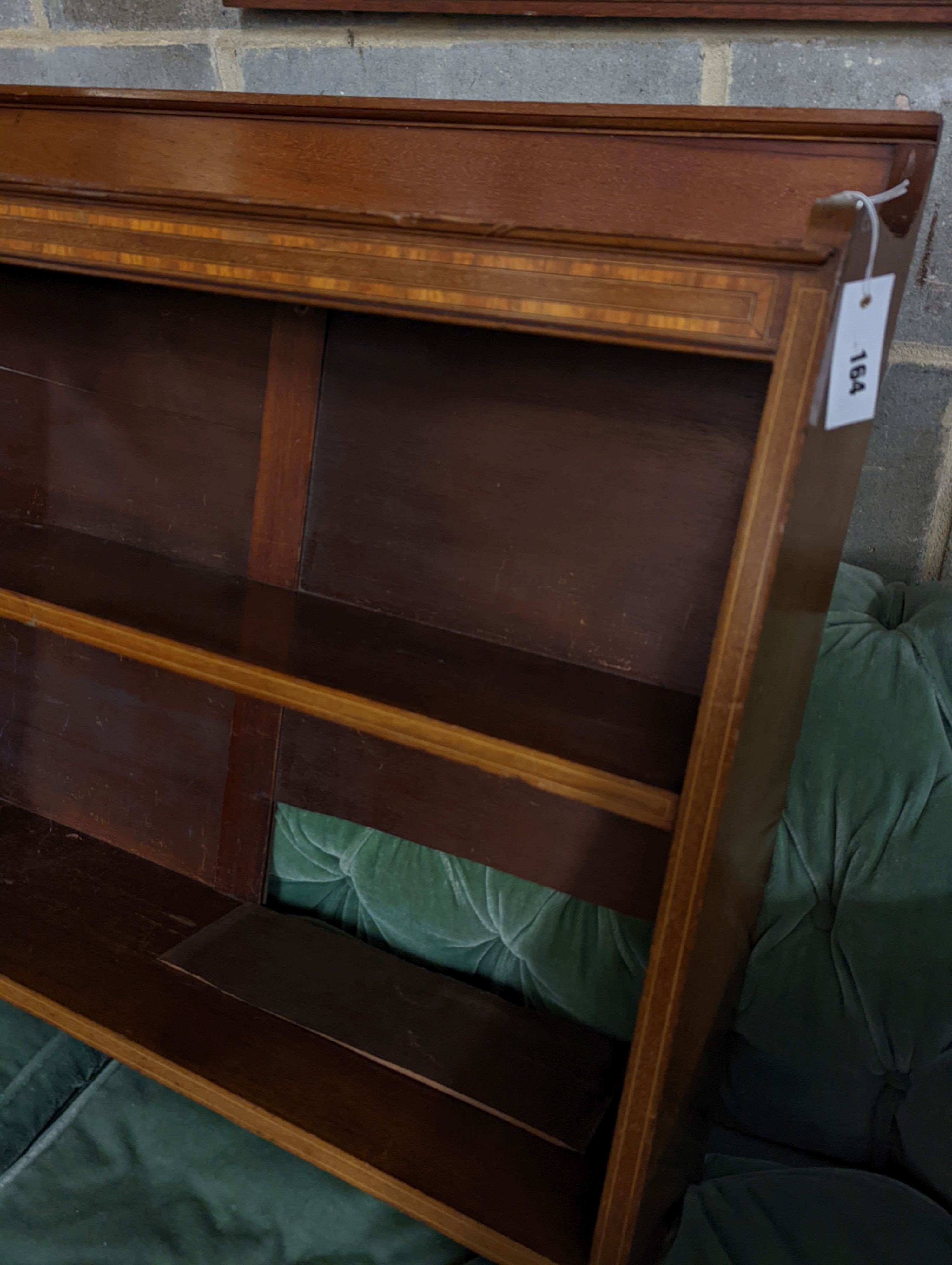 An Edwardian satinwood banded mahogany wall bracket, width 92cm, depth 23cm, height 72cm